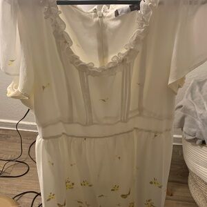 White Dress with Yellow Floral Accents